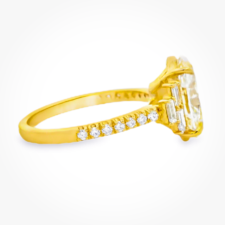 Yellow Gold Oval Diamond Ring with Stepped Baguette Accents