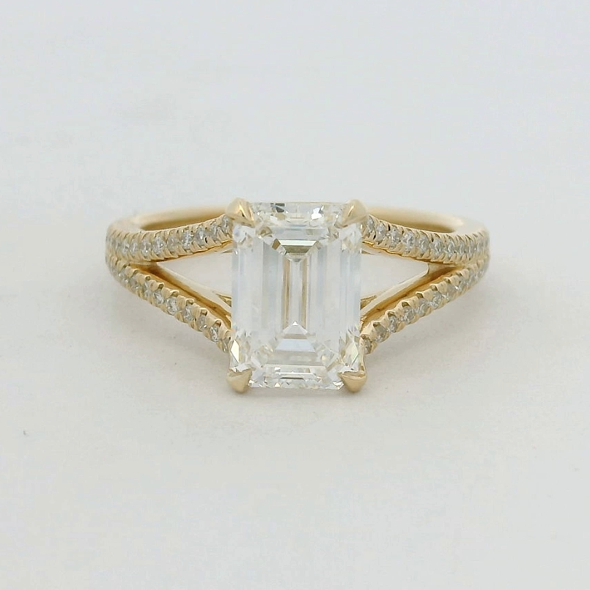 14KT yellow gold split shank Emerald LG Dia Engagement Ring