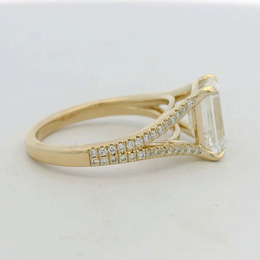14KT yellow gold split shank Emerald LG Dia Engagement Ring