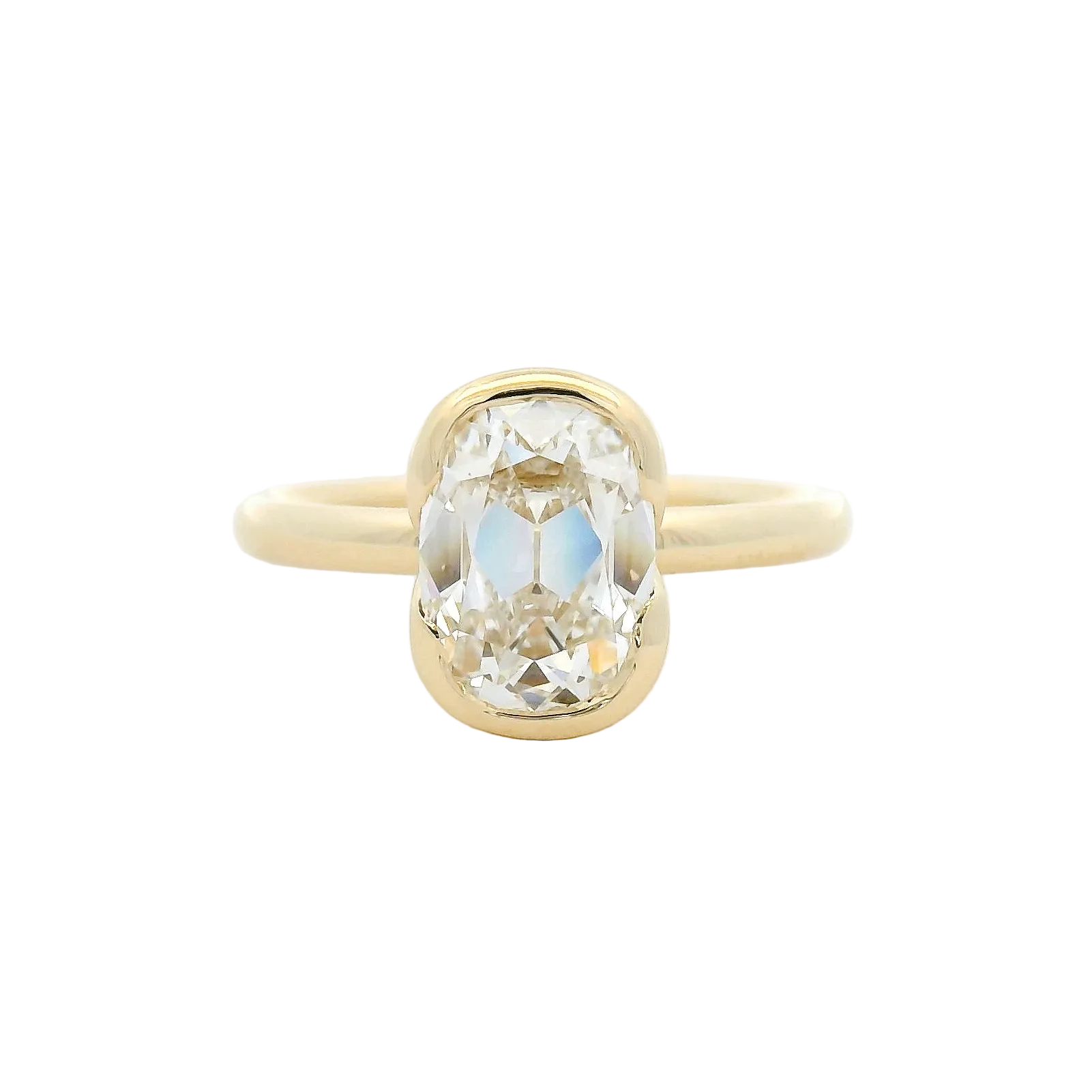 Elongated Diamond Bezel Solitaire Ring in Yellow Gold