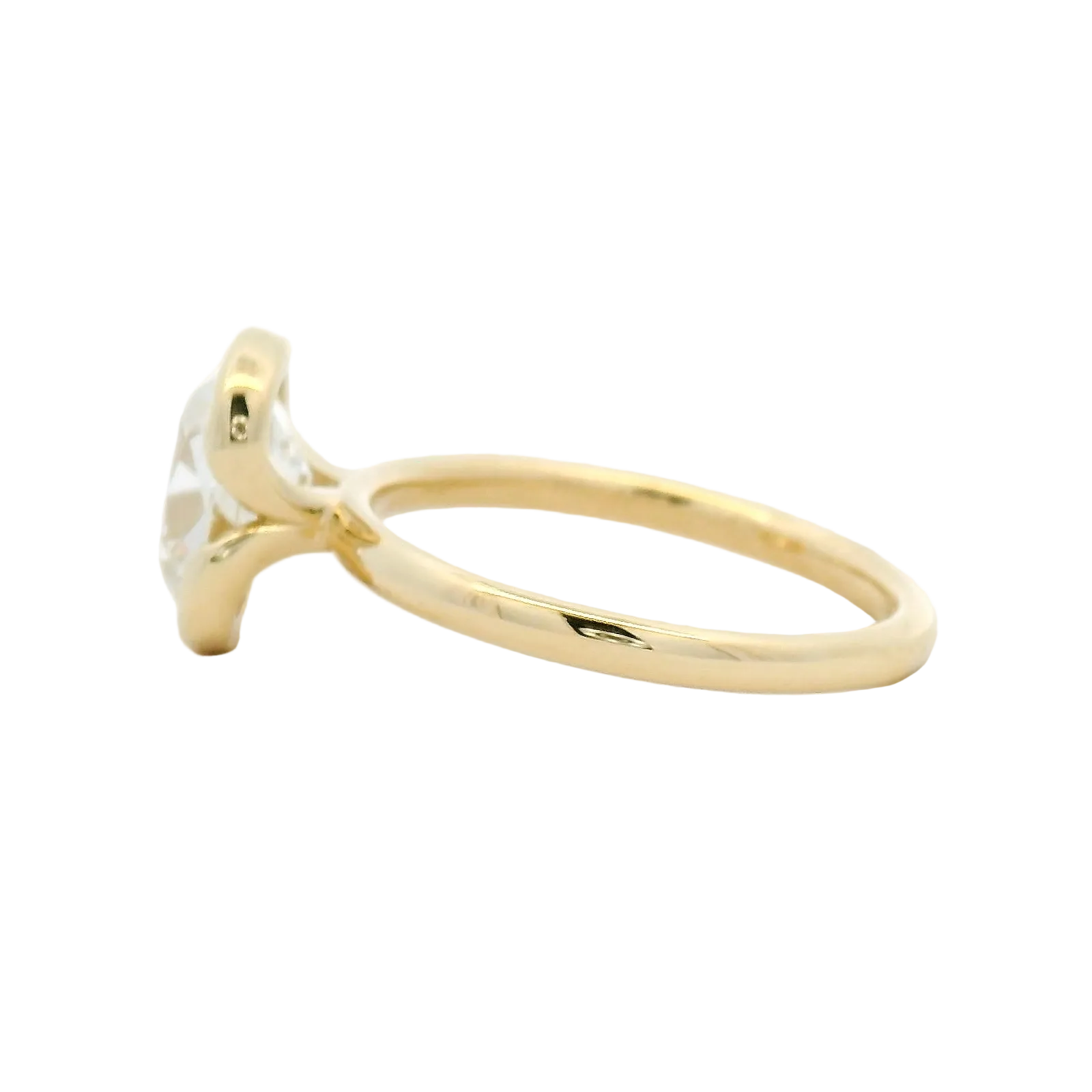 Elongated Diamond Bezel Solitaire Ring in Yellow Gold