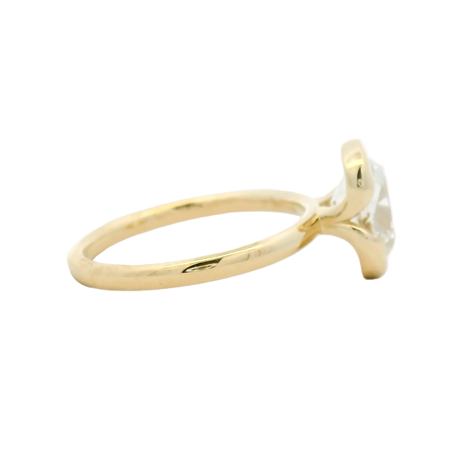 Elongated Diamond Bezel Solitaire Ring in Yellow Gold