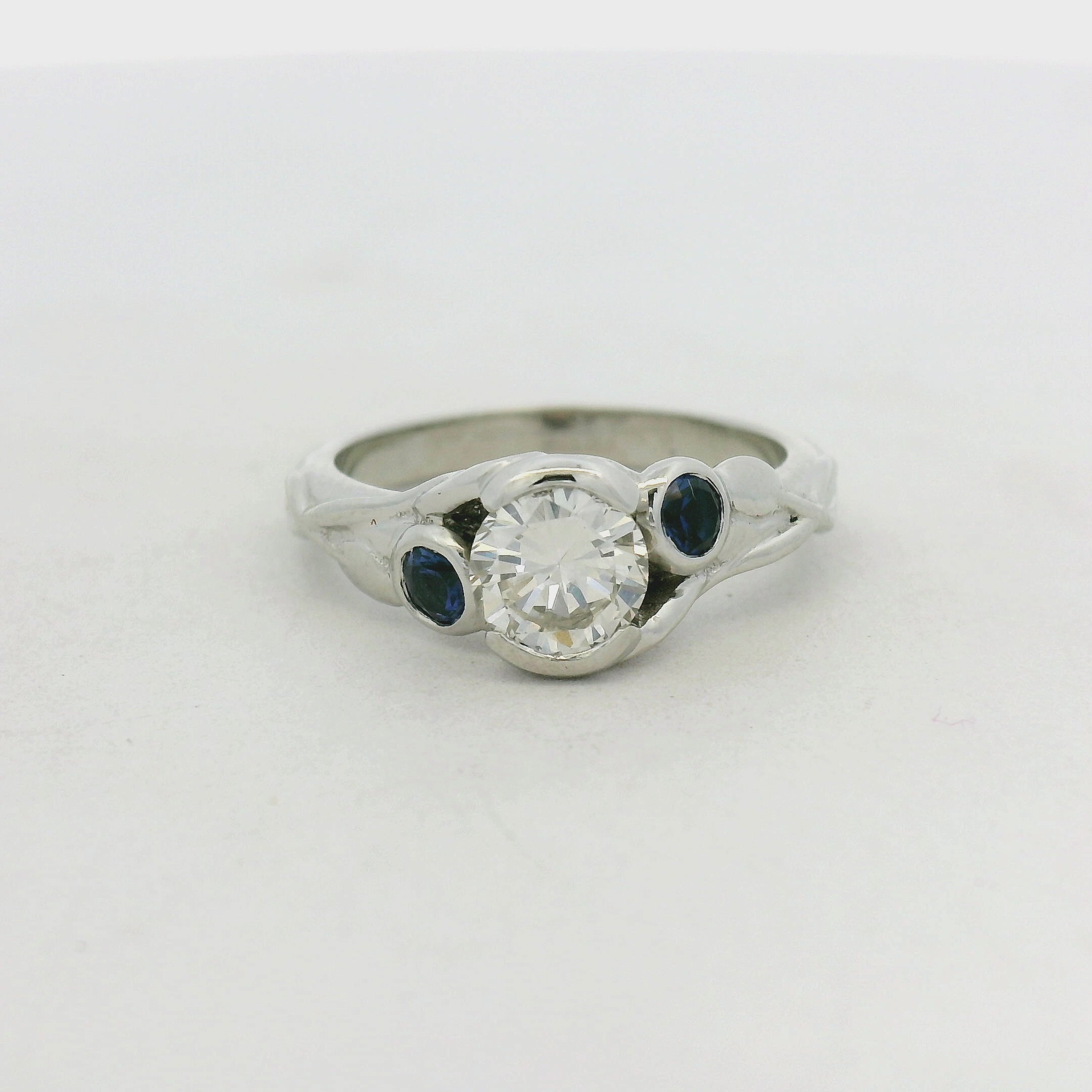 Platinum custom made engagement ring with a floral pattern