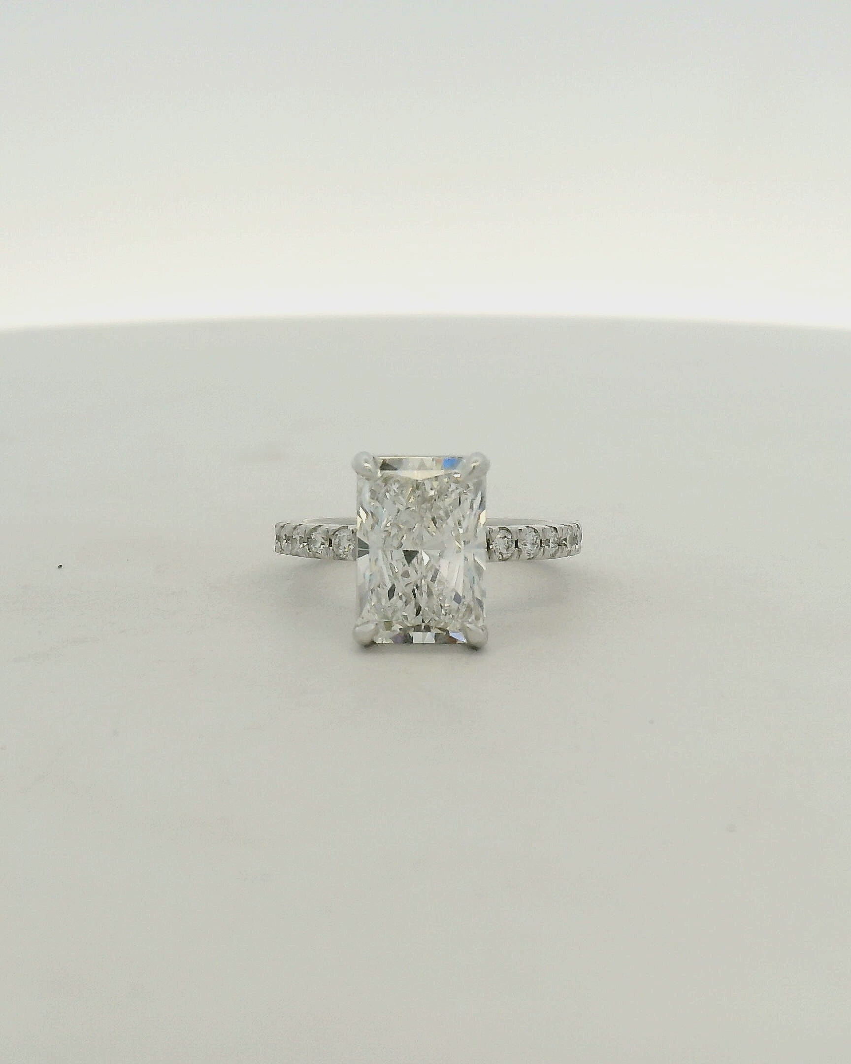 Radiant Cut Diamond Ring with Pavé Band in White Gold