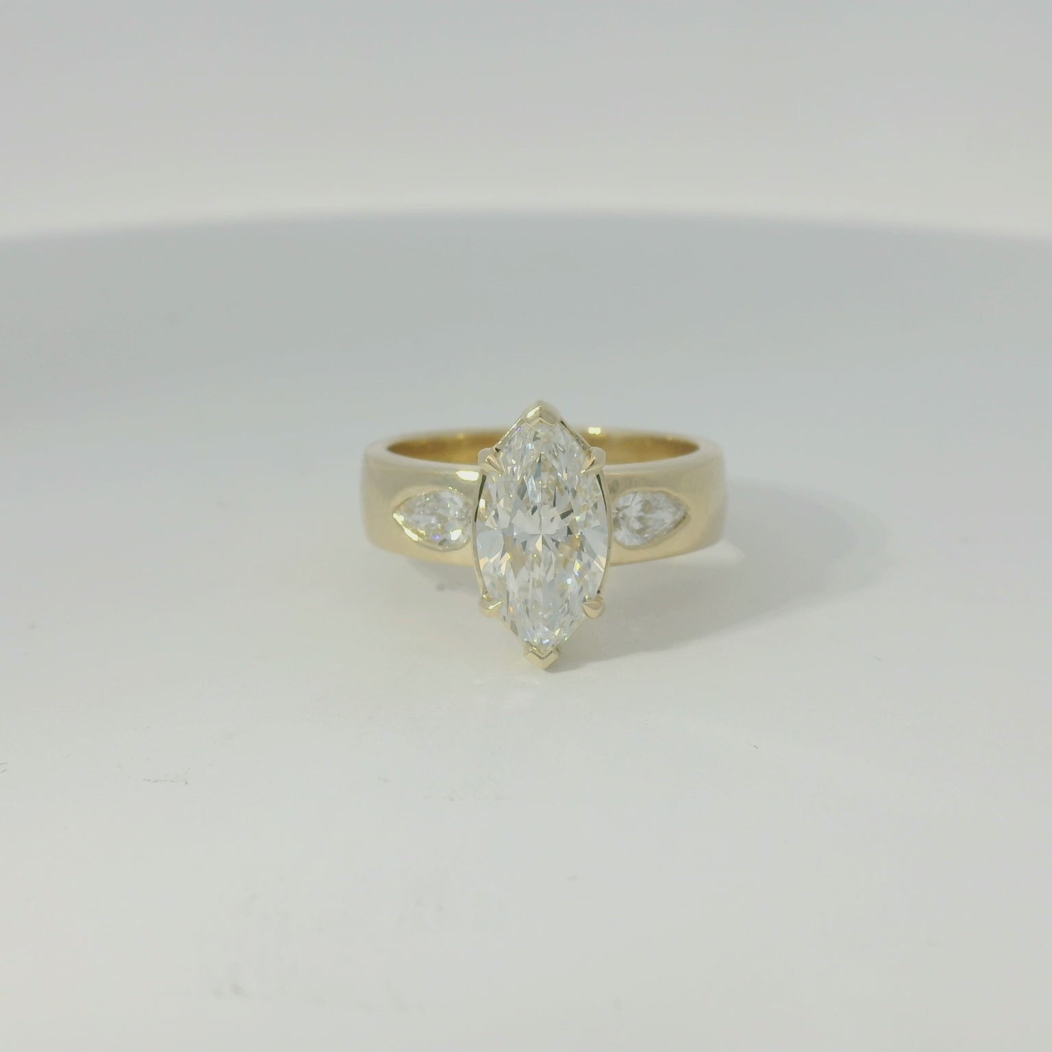 Yellow Gold Multistone Ring with Pear Cut Diamond