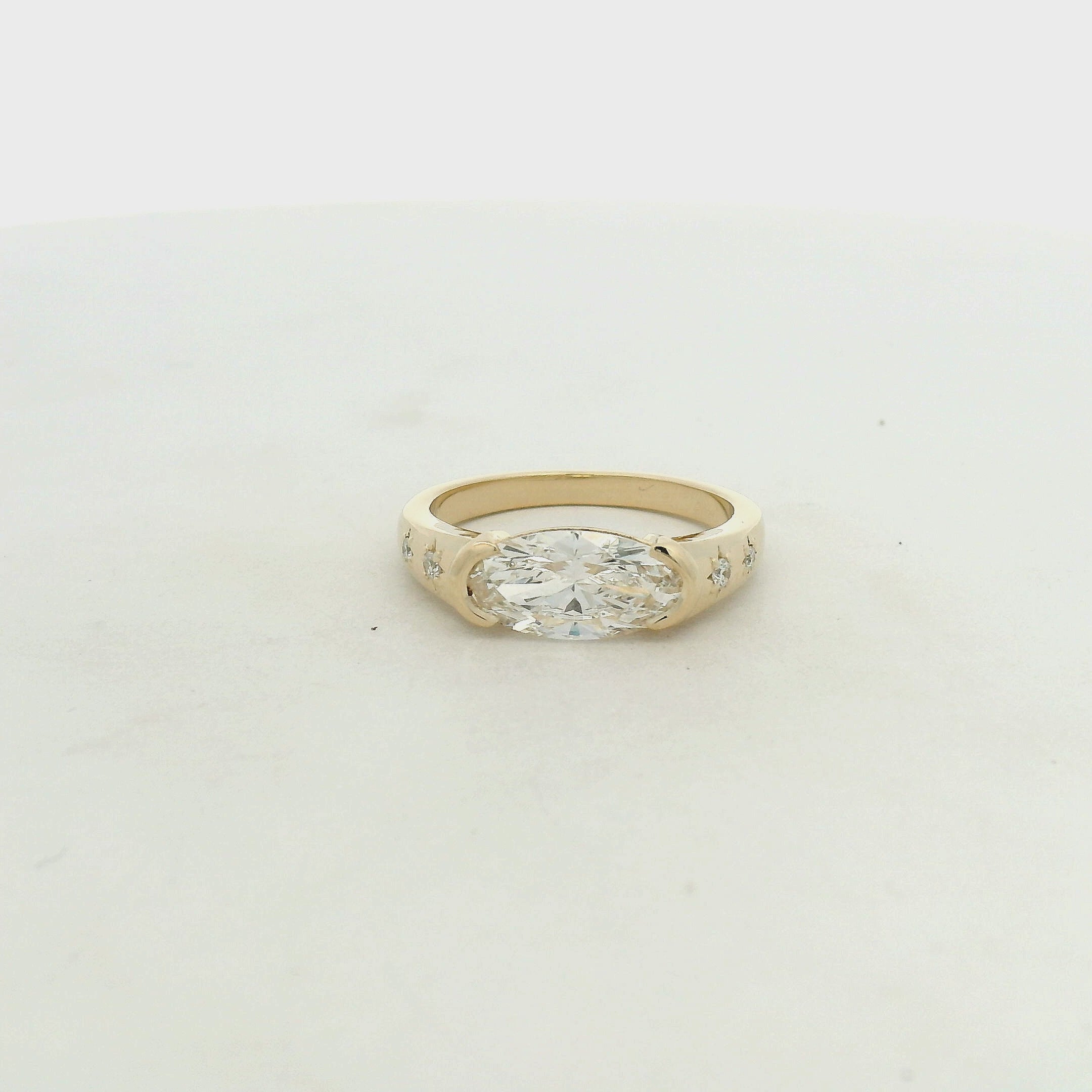 Yellow Gold East-West Diamond Ring with Star Accents