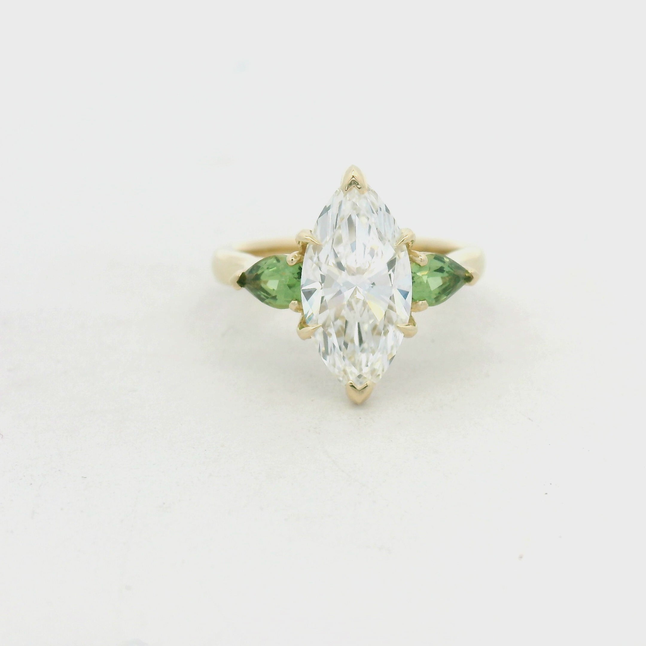 Marquise and Pear Emerald Multi-Stone Ring in Yellow Gold