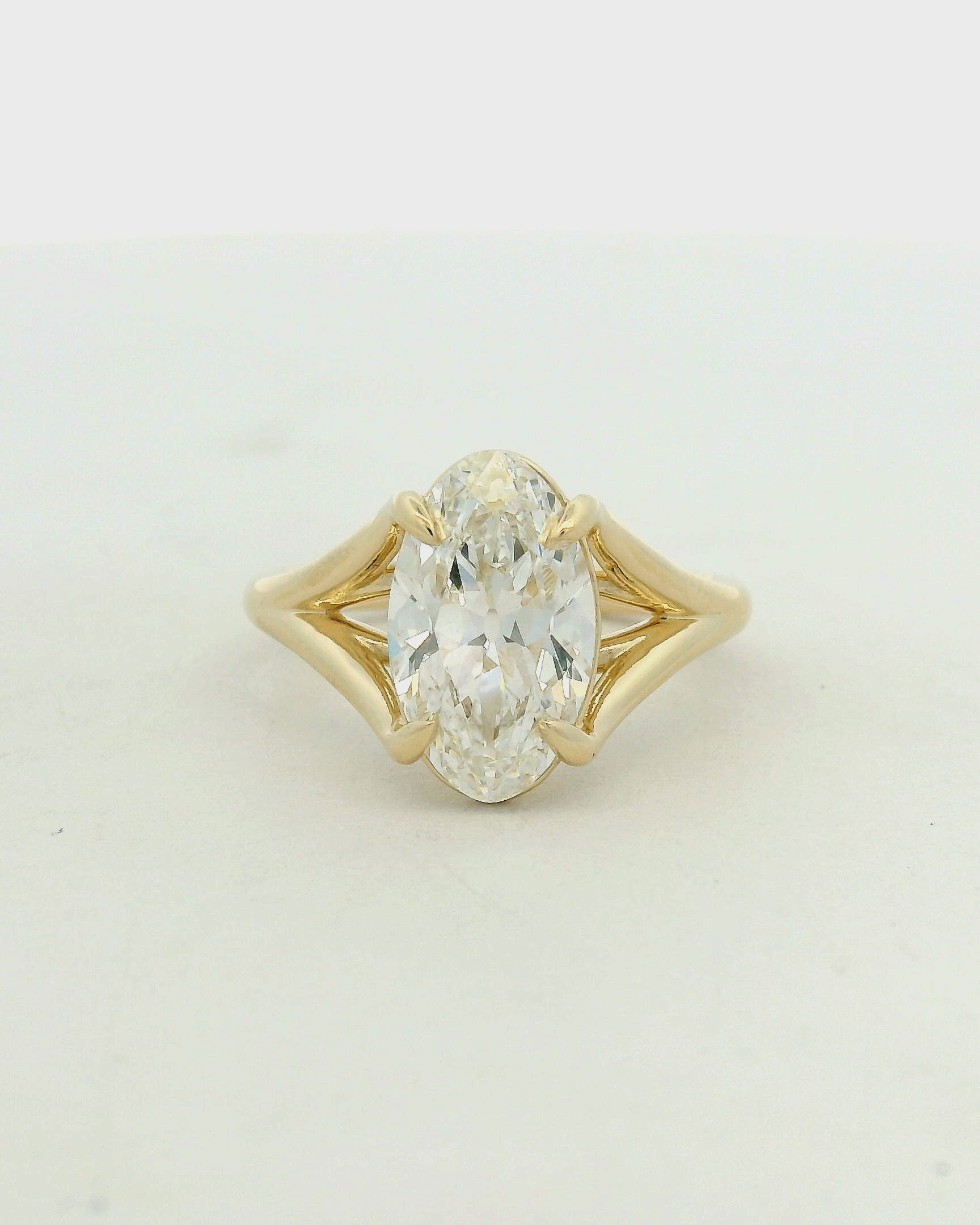 Marquise Diamond Split Shank Solitaire Ring in Yellow Gold