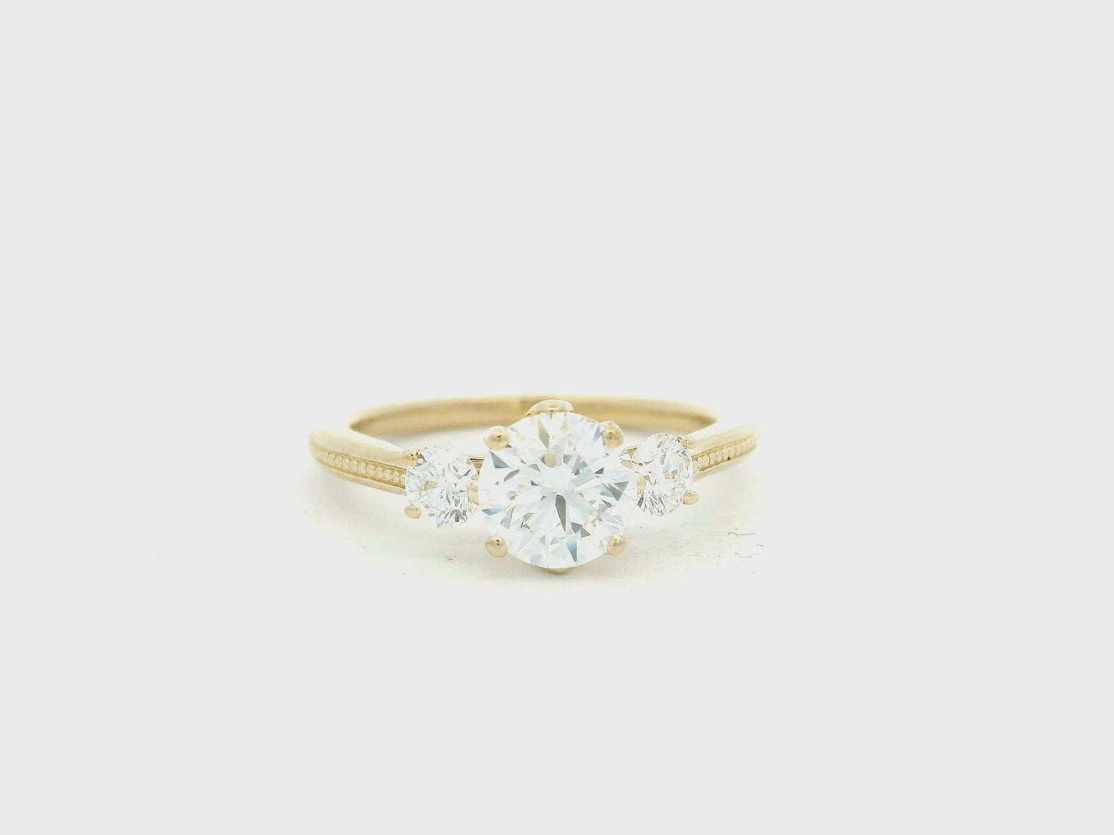 Elegant Three-Stone Diamond Ring