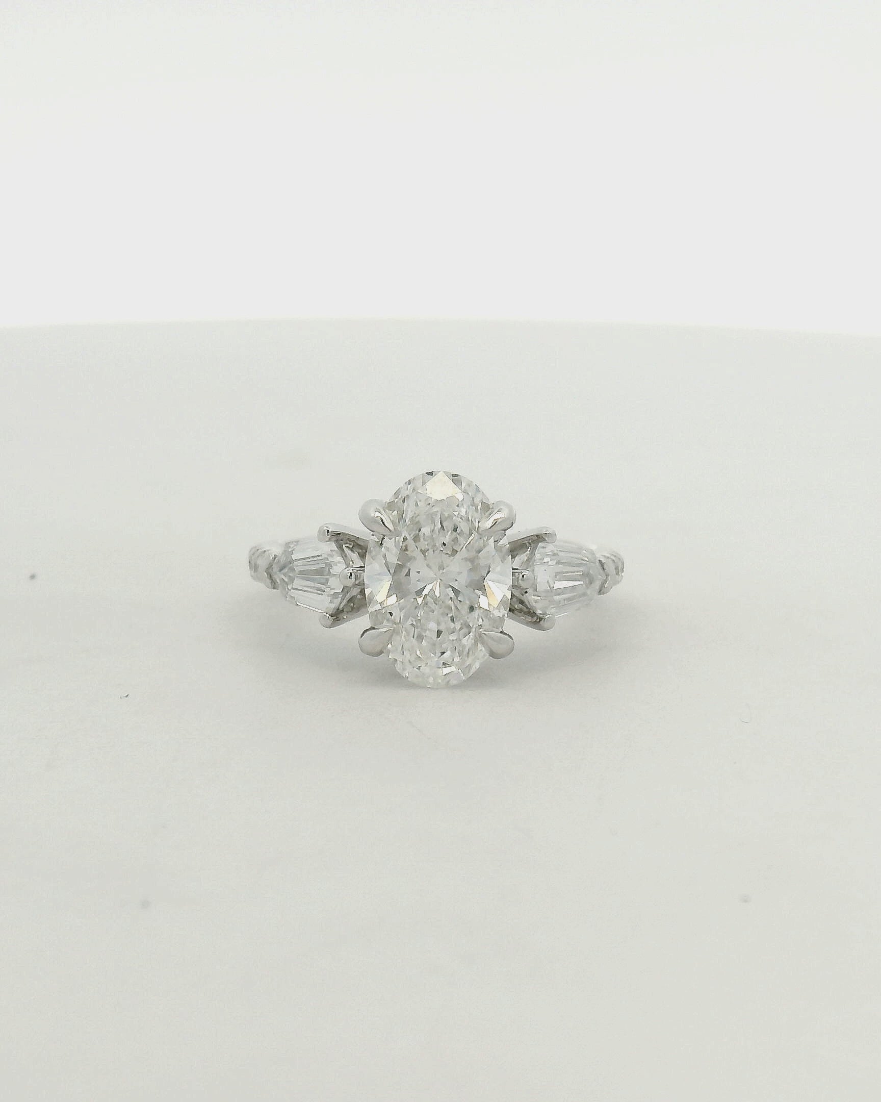 Oval Diamond Three-Stone Ring in White Gold