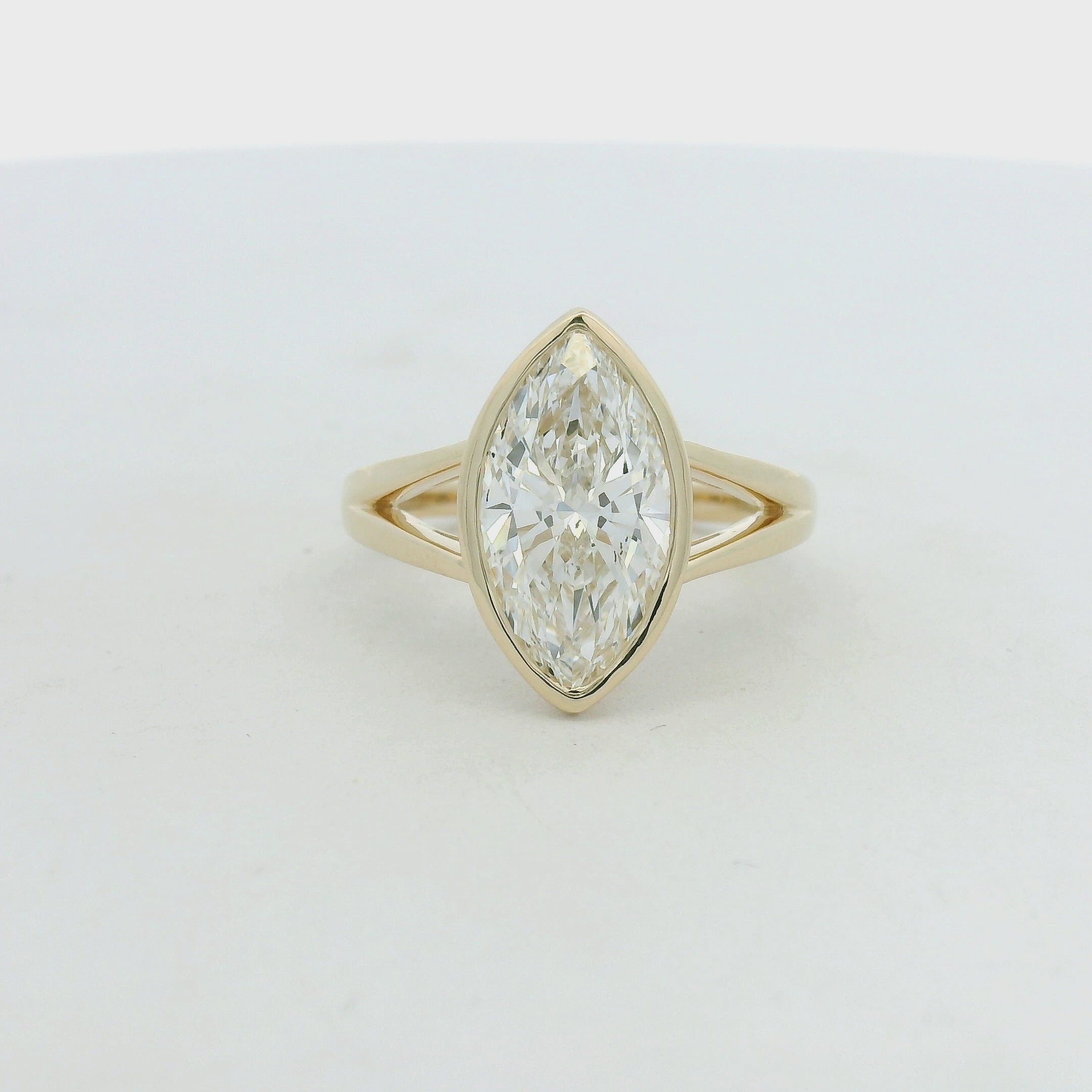 Marquise Diamond Bezel Solitaire Ring in Yellow Gold