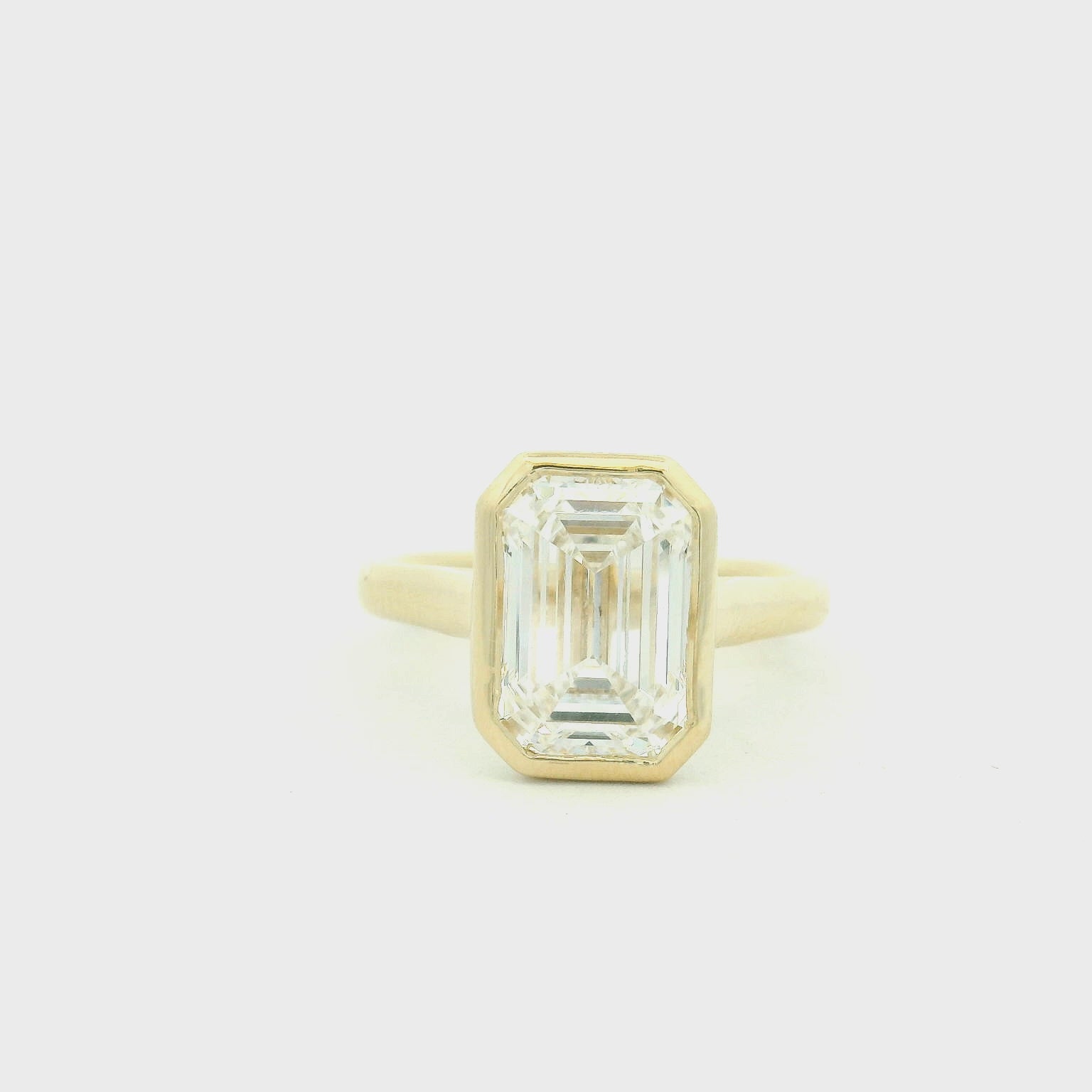 Bezel set Emerald-Cut Diamond