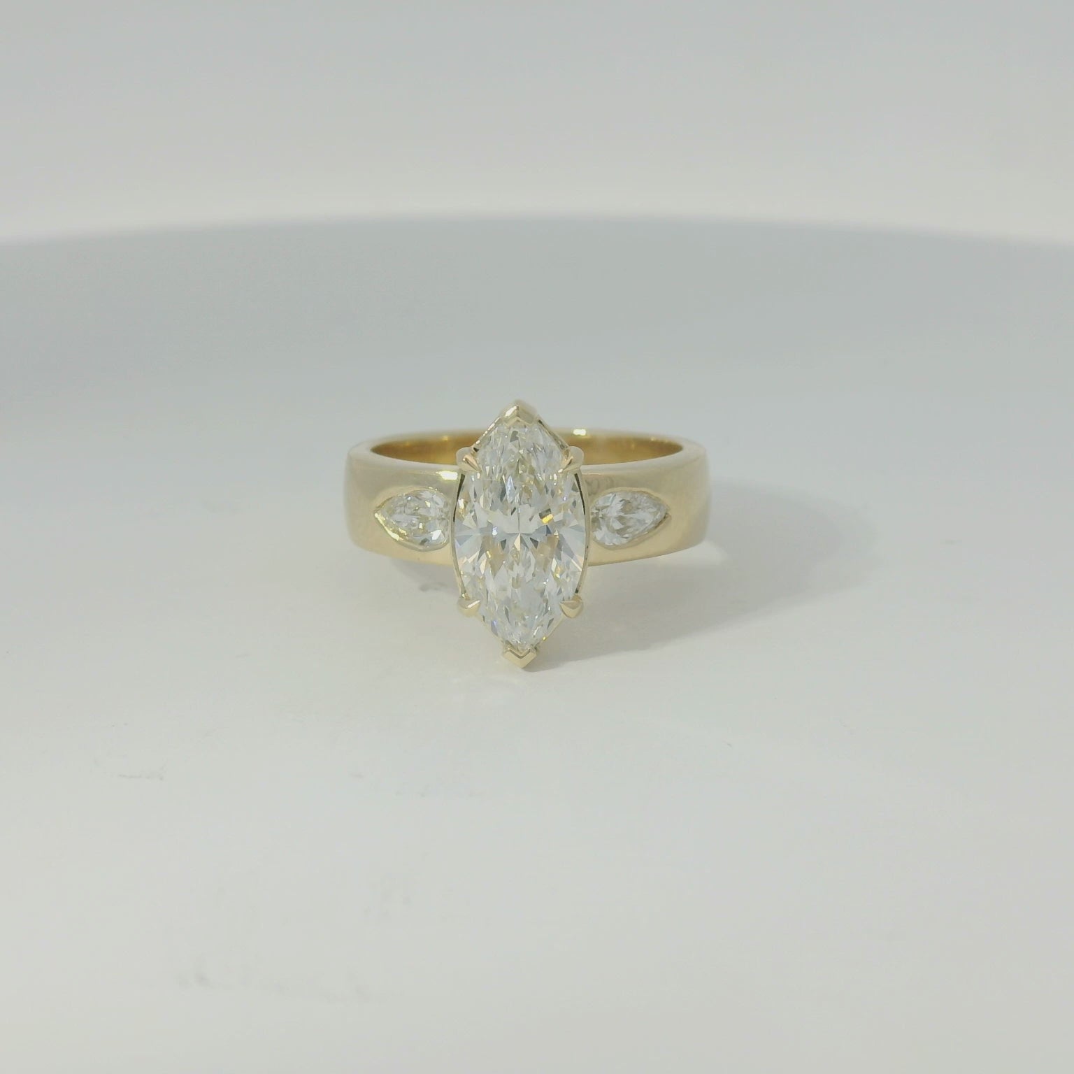 Gold Marquise Wedding Band