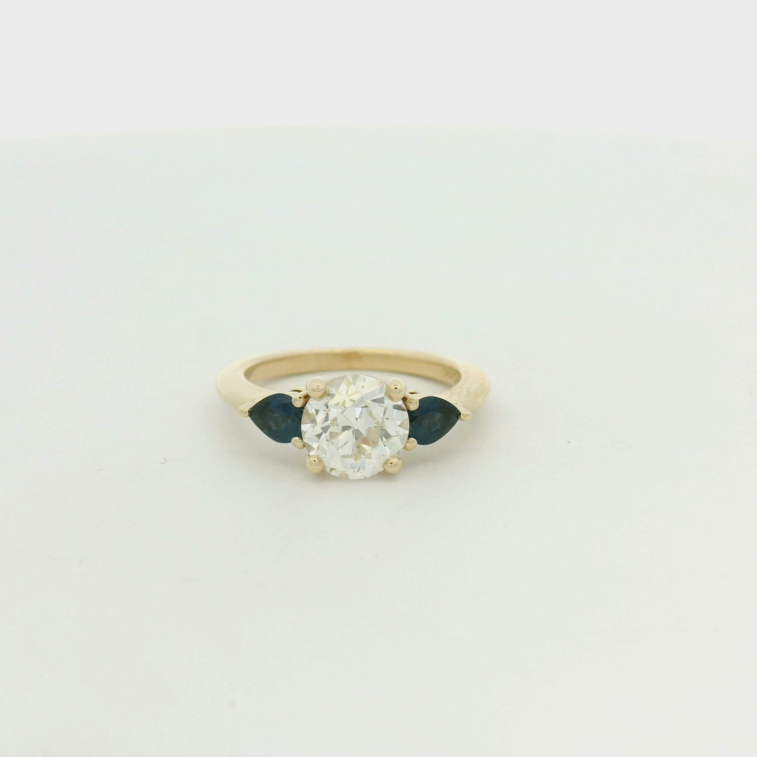 old euro and pear side sapphire ring