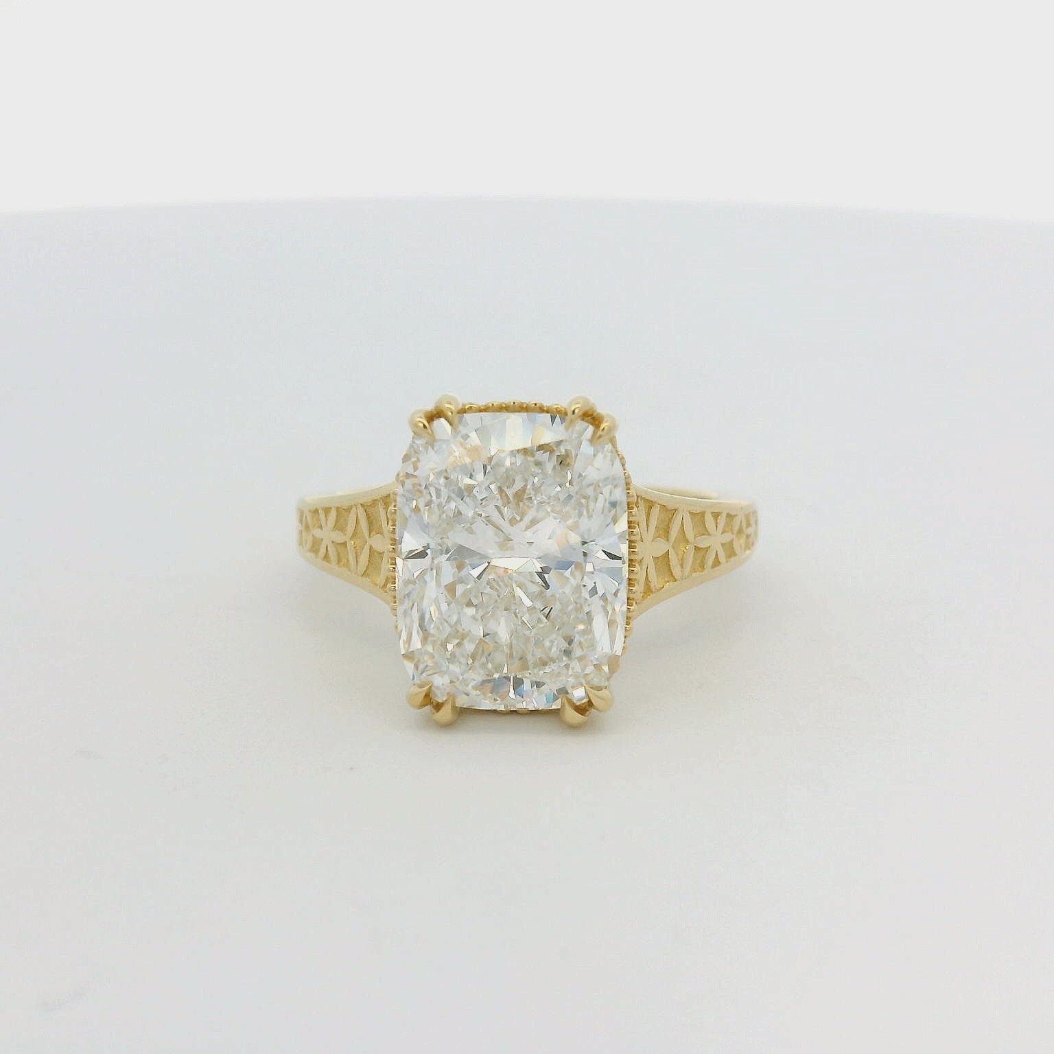 14KT yellow gold double prong detailed band 5.04ct elongated cushion LG diamond engagement ring