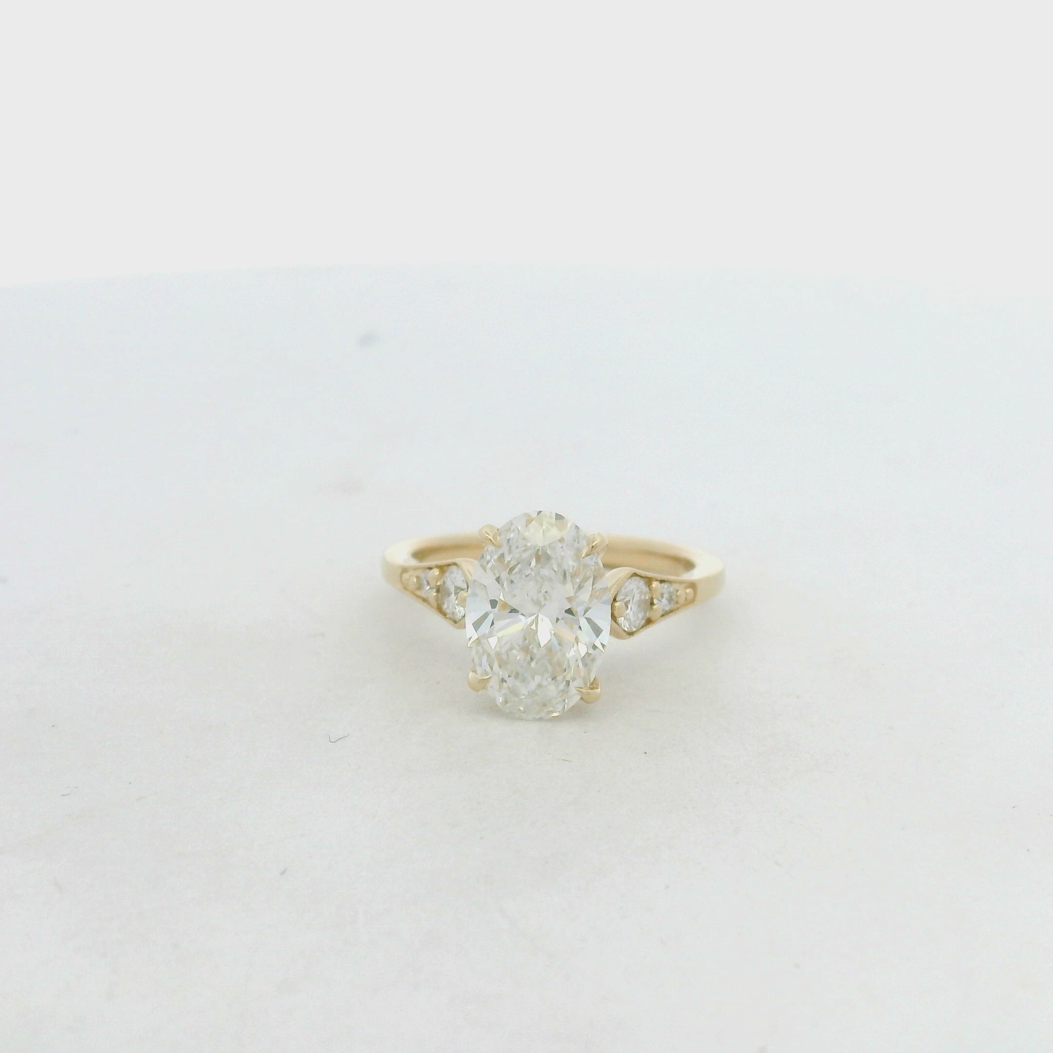 Yellow Gold Oval Diamond Engagement Ring with Accent Stones