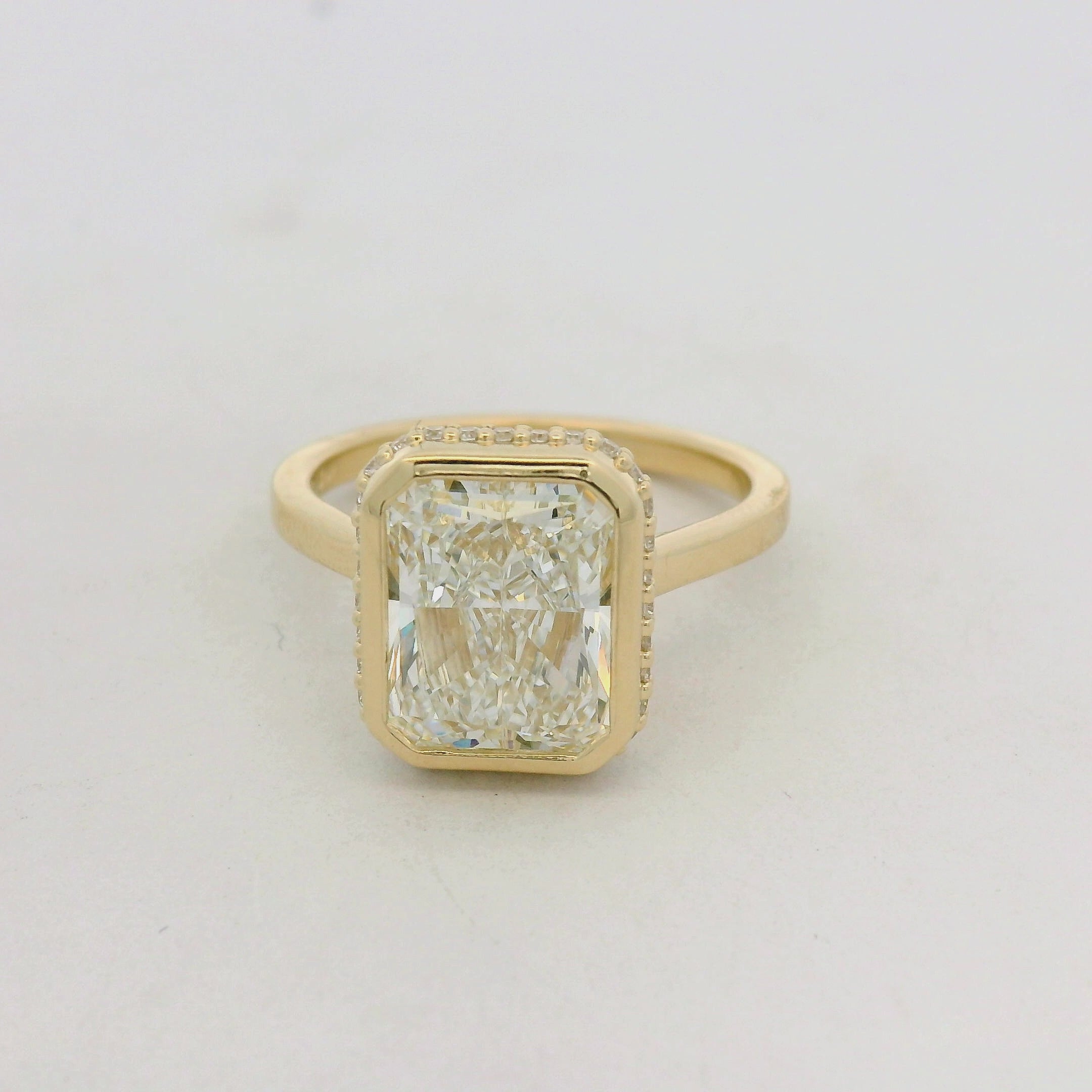 Radiant-Cut Diamond Bezel-Set Solitaire Ring in Yellow Gold