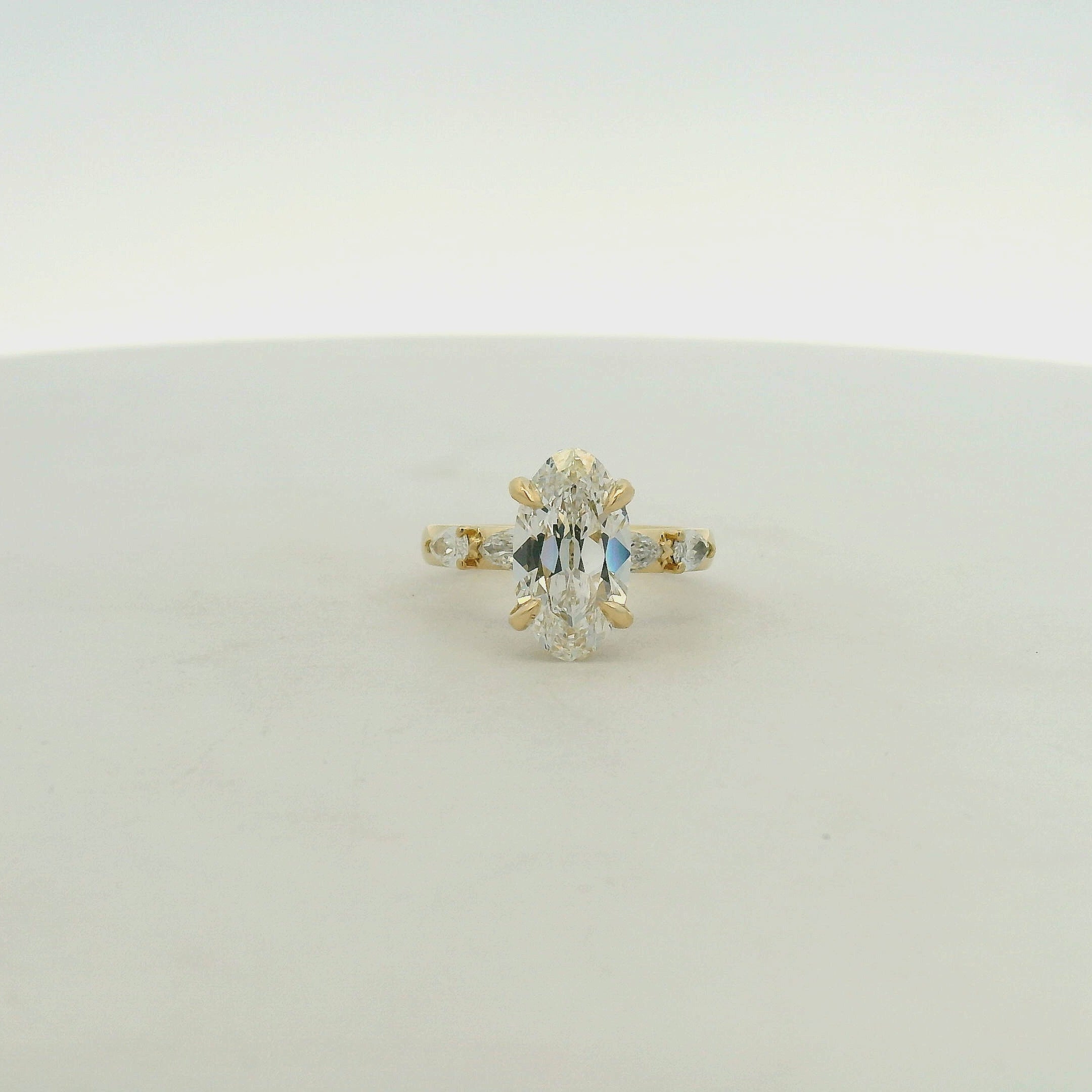 Moval Cut Diamond Solitaire Ring in Yellow Gold