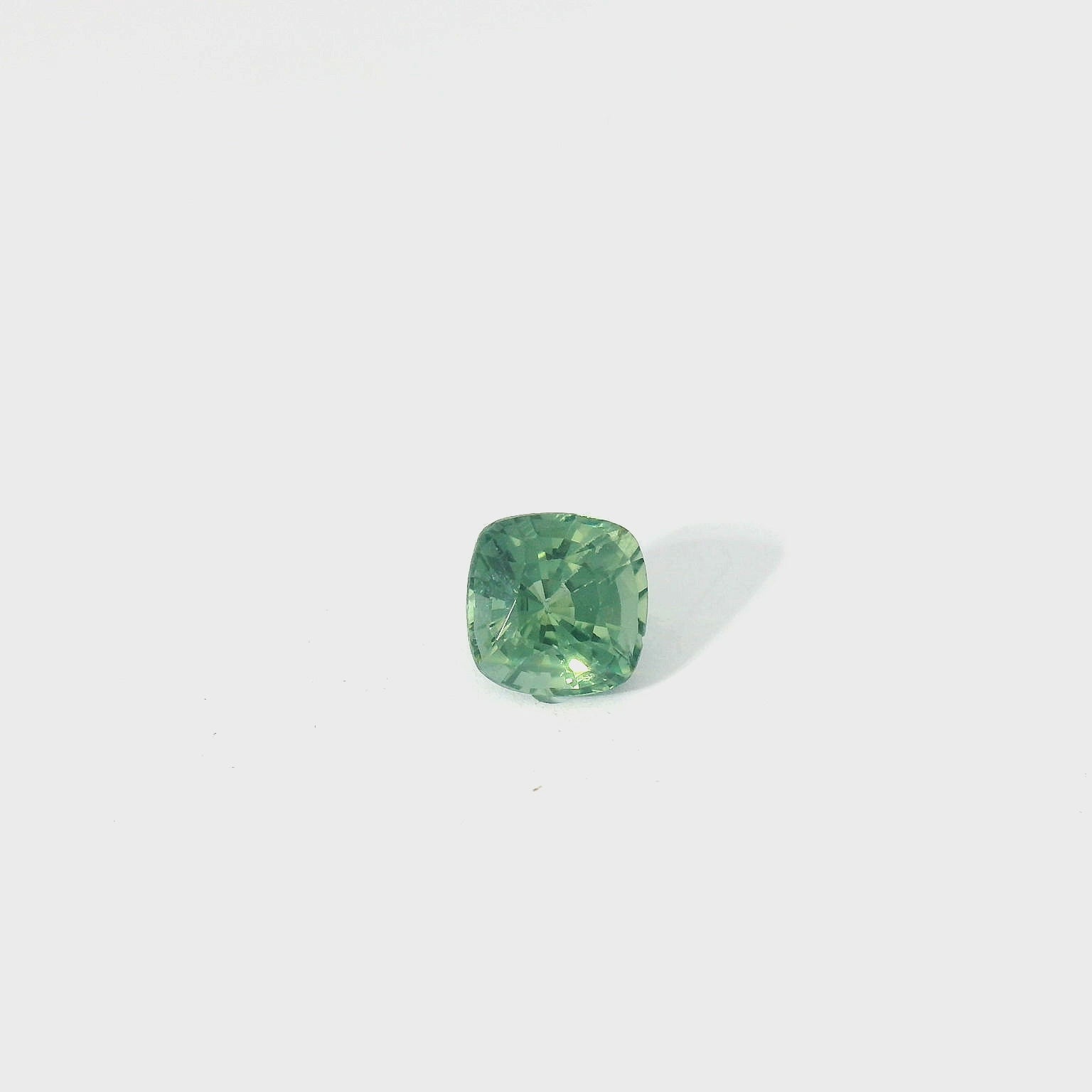 green cushion sapphire