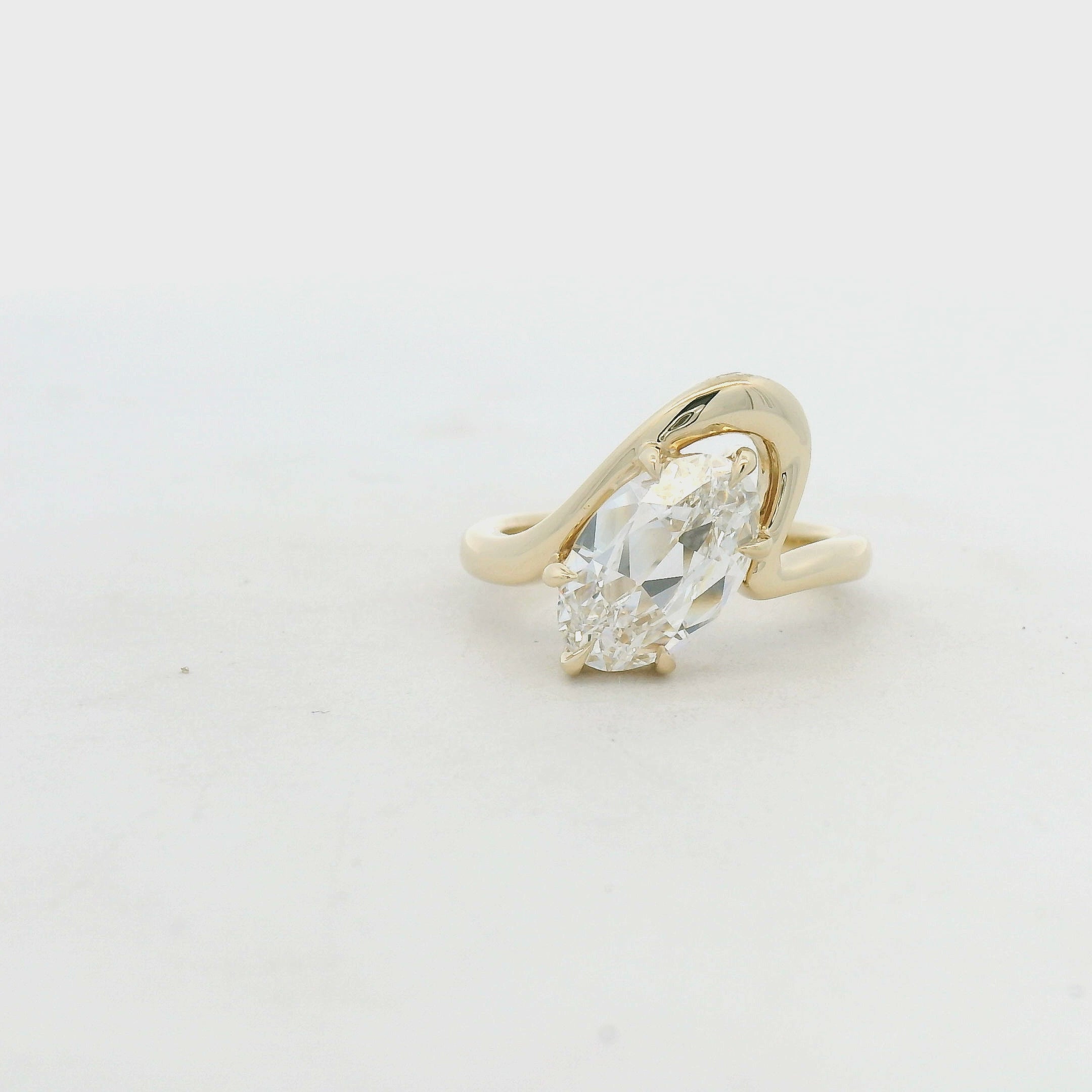 moval Diamond Bypass Solitaire Ring in Yellow Gold