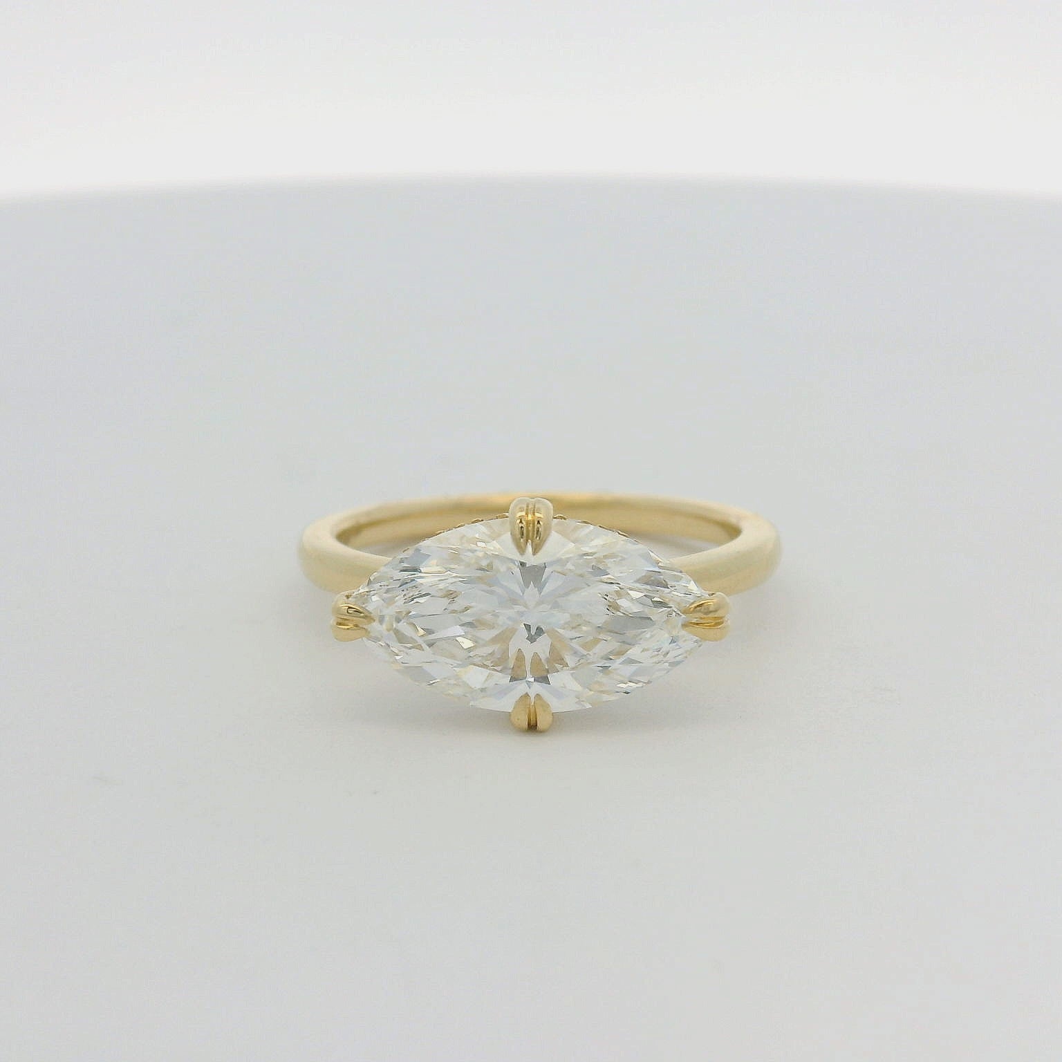 14KT yellow gold east-west hidden halo marquise 3.04ct LG diamond engagement ring