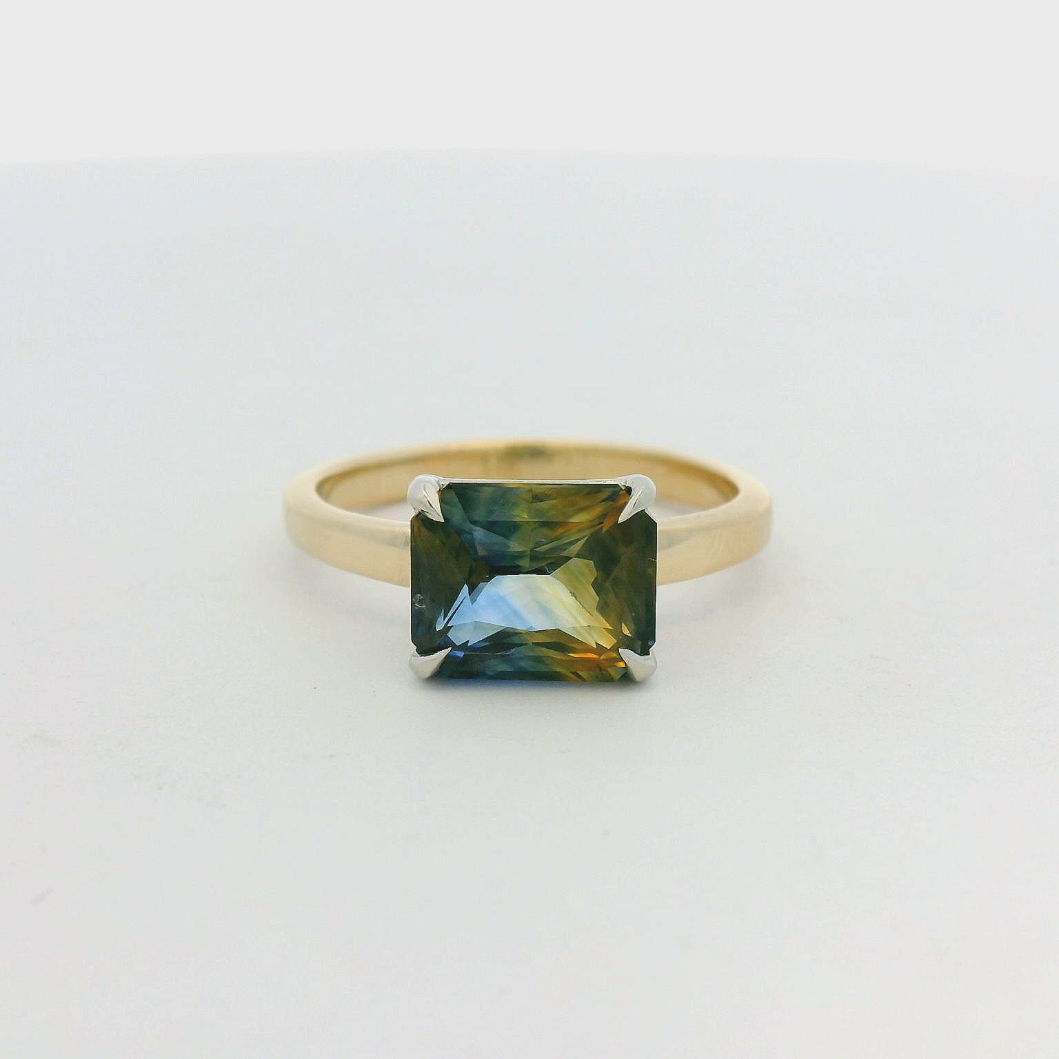 14KT yellow two tone gold east west bicolor sapphire solitaire engagement ring