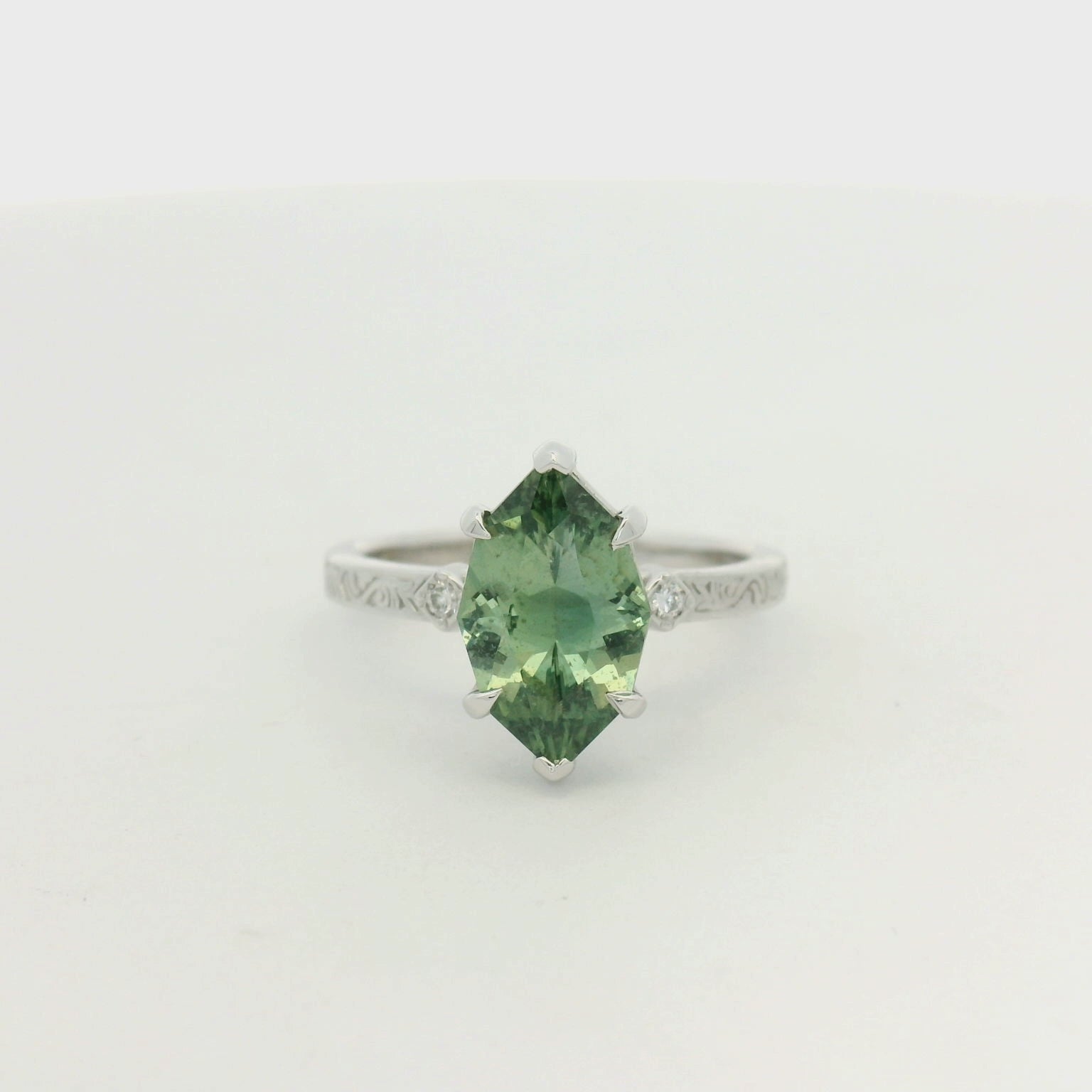green sapphire engagement ring