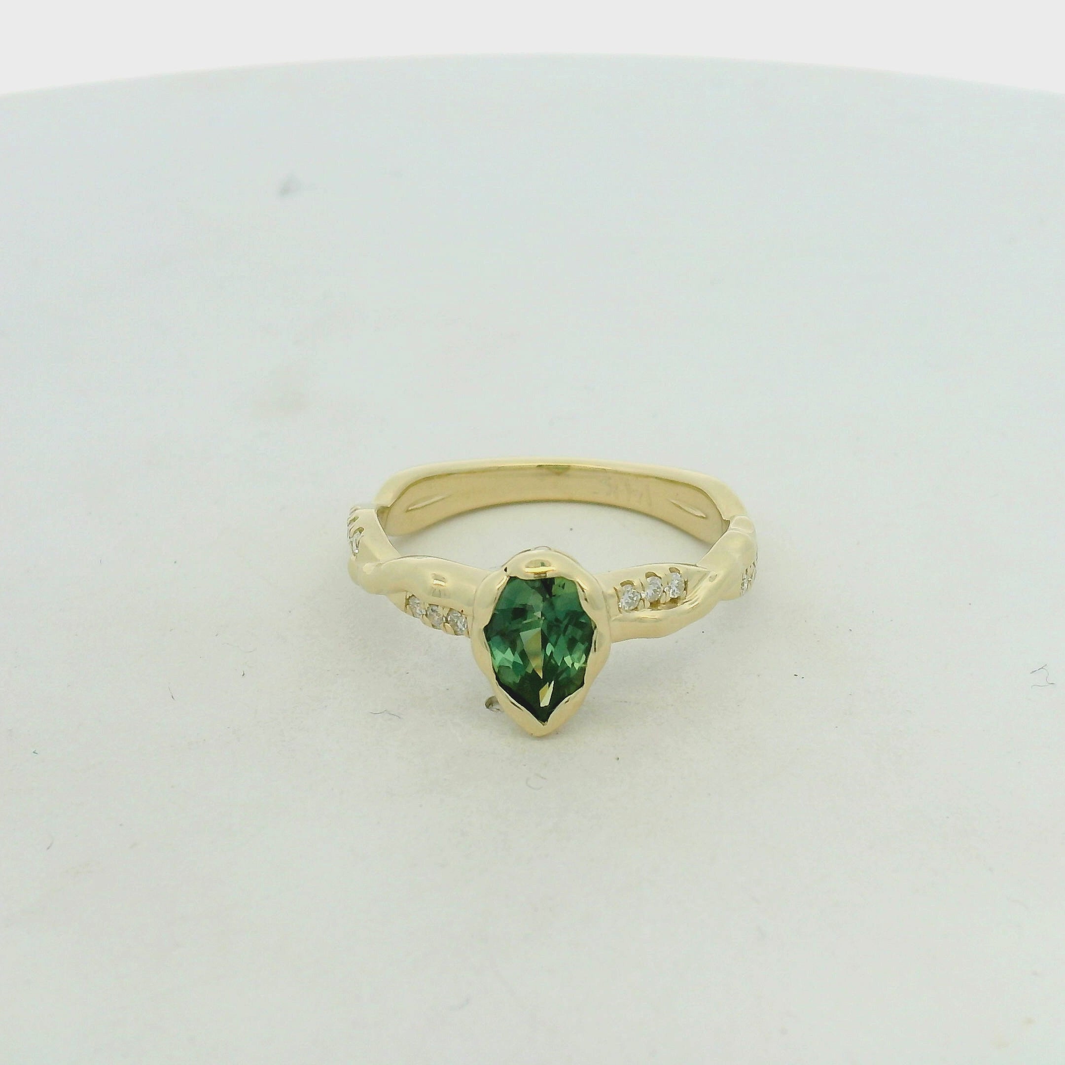 Green Tourmaline Bezel Solitaire Ring in Yellow Gold