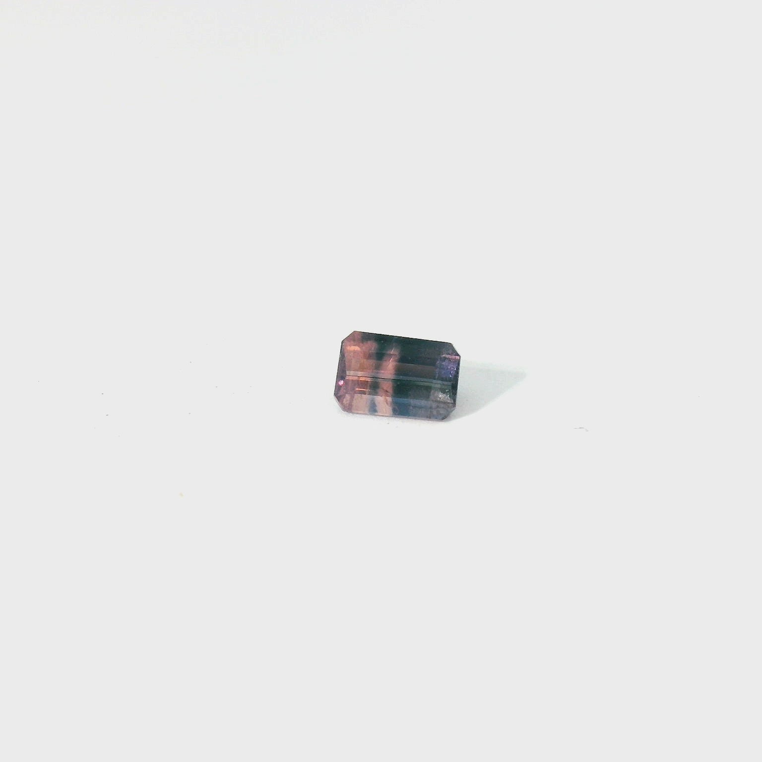 bi-color emerald cut sapphire