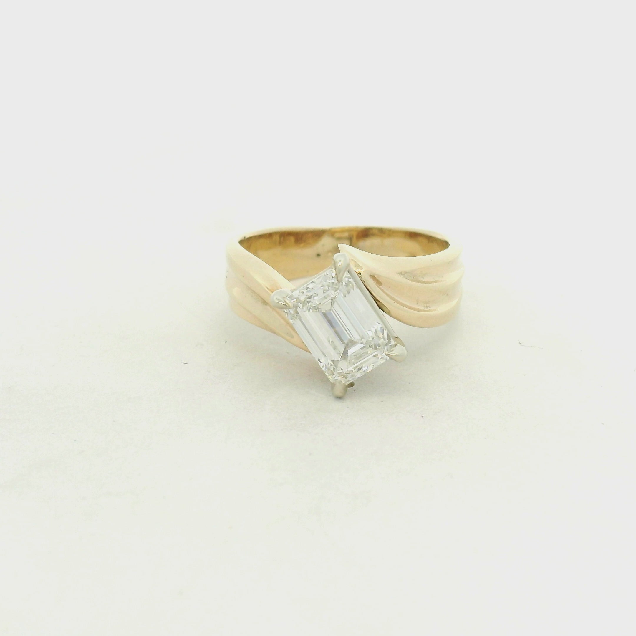 Emerald-Cut Diamond Bypass Solitaire Ring in Yellow Gold