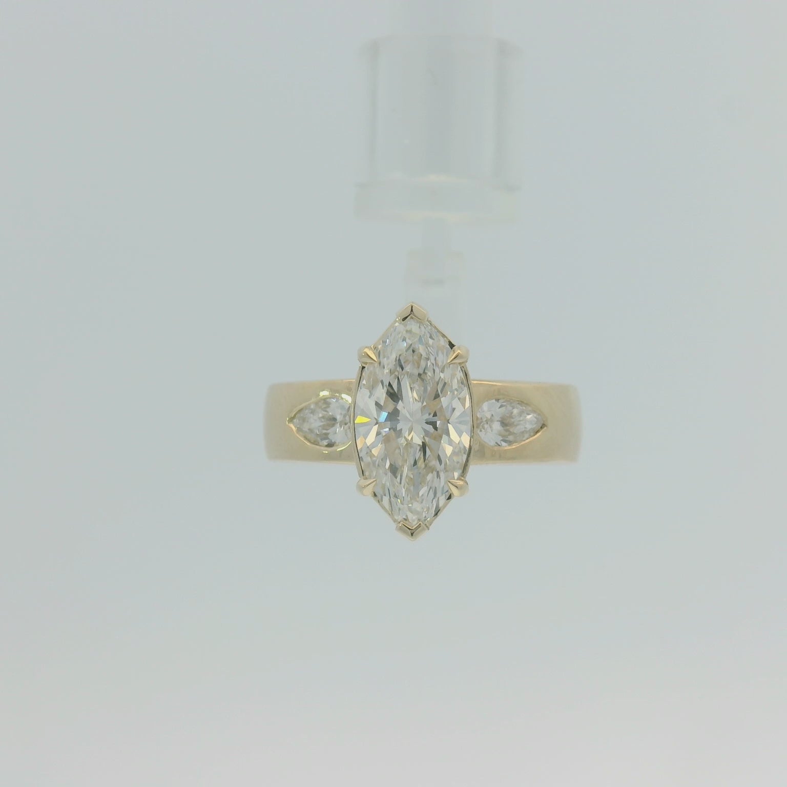Yellow Gold Multistone Ring with Emerald Cut Diamond