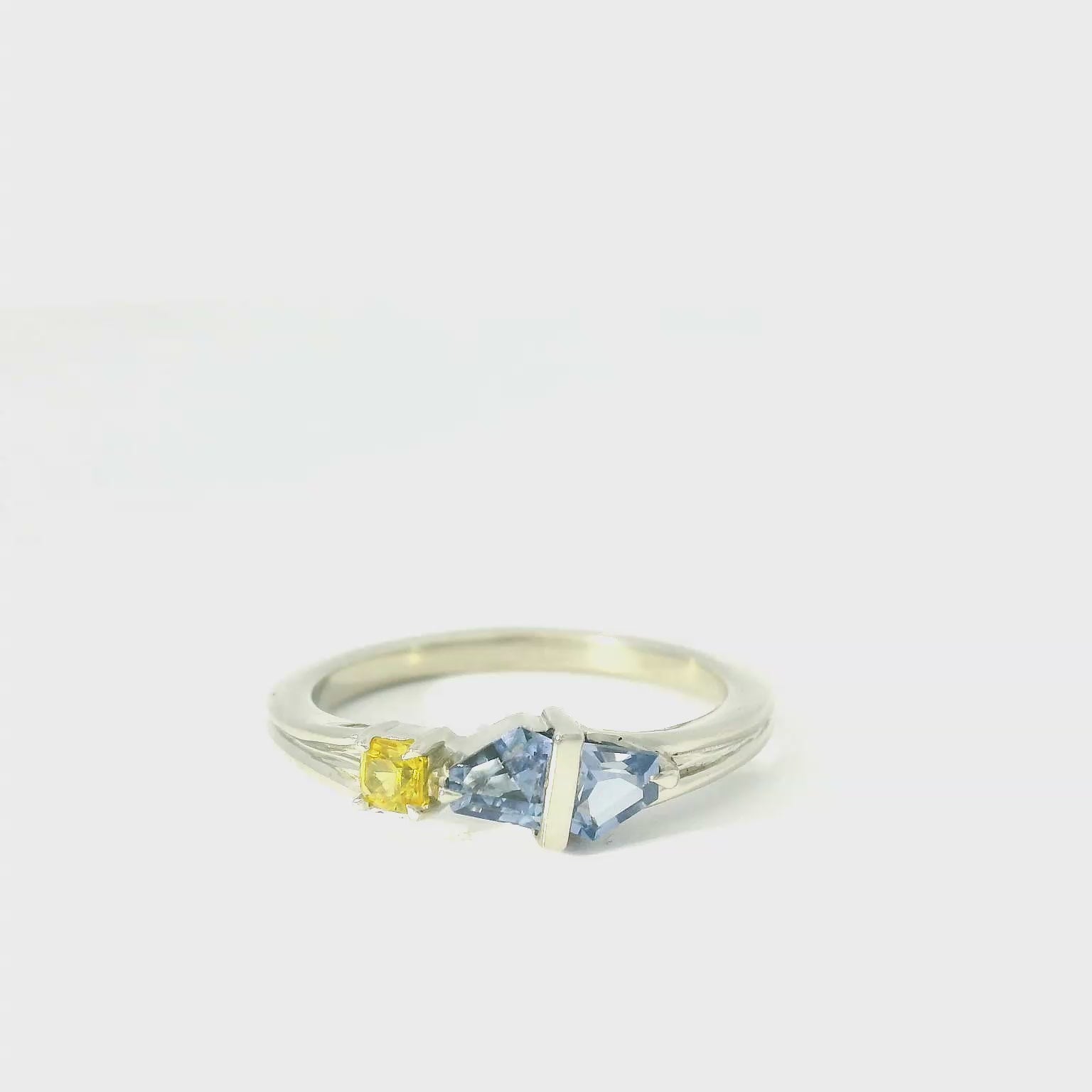 Elegant White Gold Ring with Gemstones