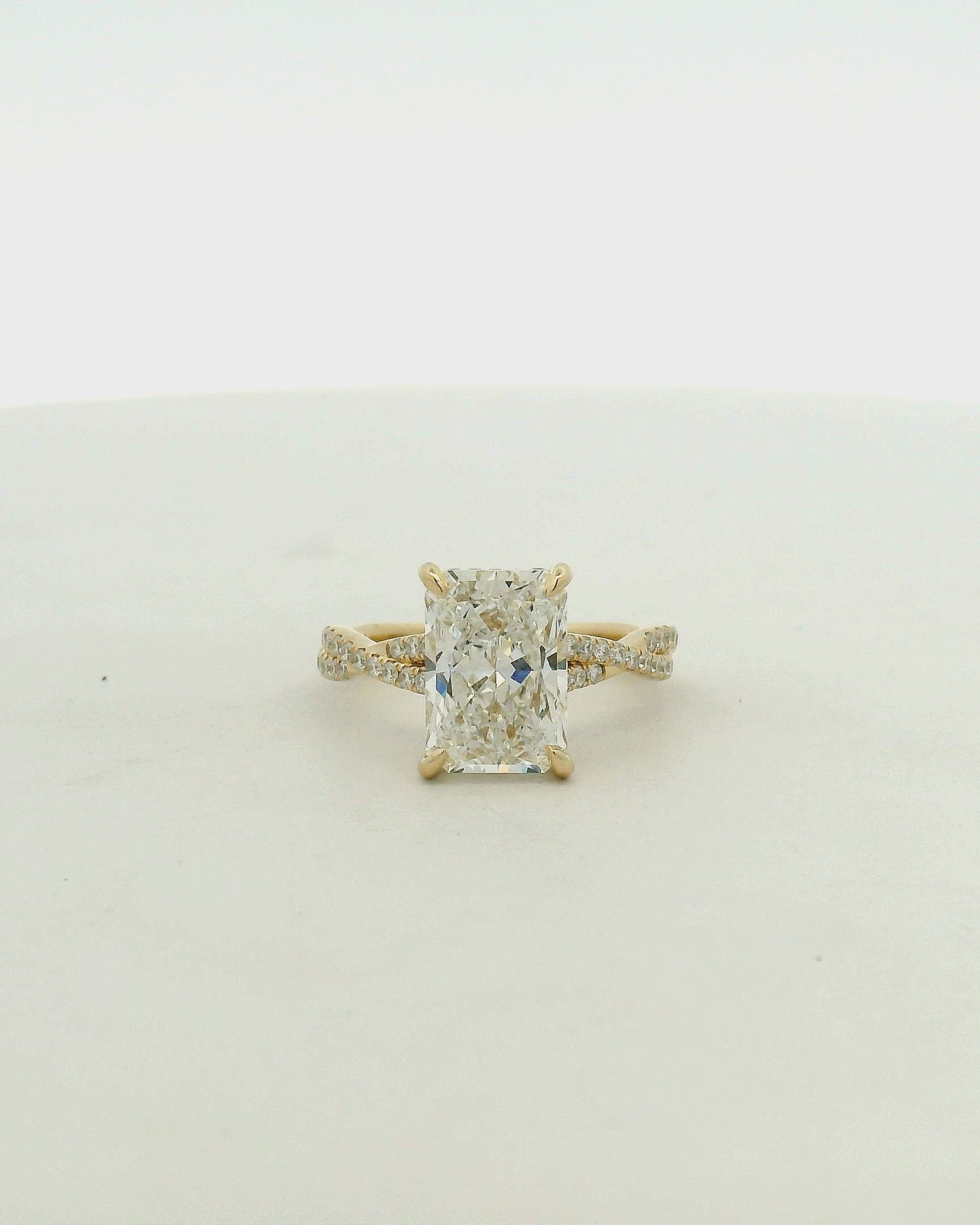 Yellow Gold Radiant Diamond Engagement Ring with Twisted Band