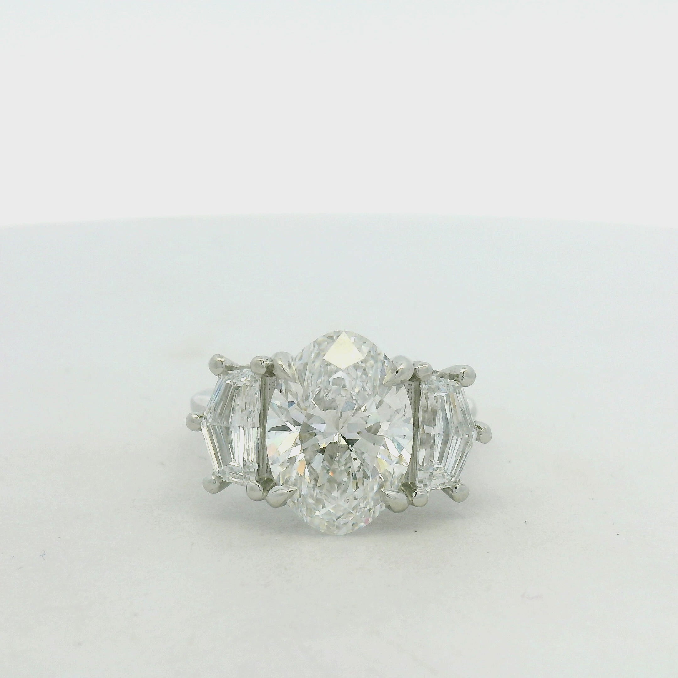 Oval Diamond Three-Stone Ring in White Gold