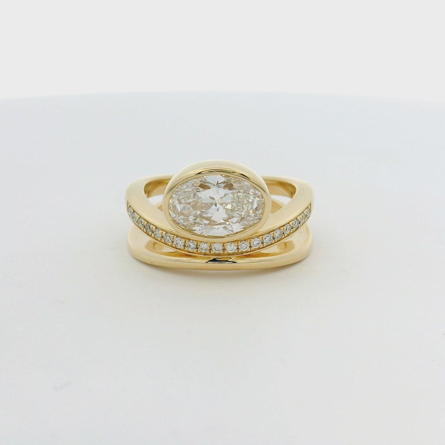 14KT yellow gold double band pave detail bezel set 2ct oval LG diamond engagement ring