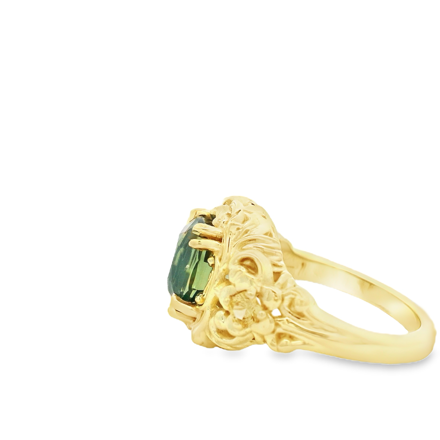 Elegant Gold Ring with Green Gemstone