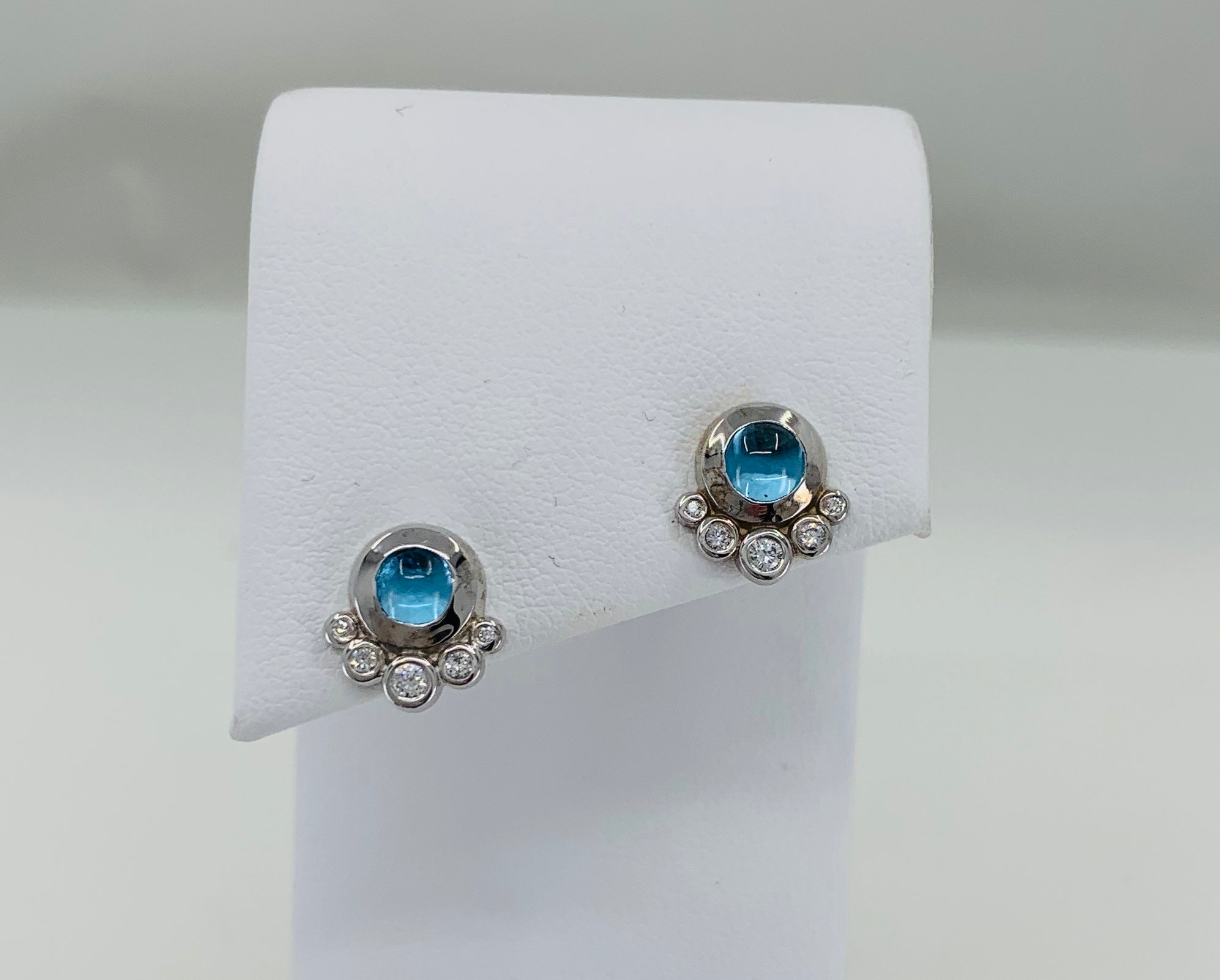 Blue topaz and diamond earrings