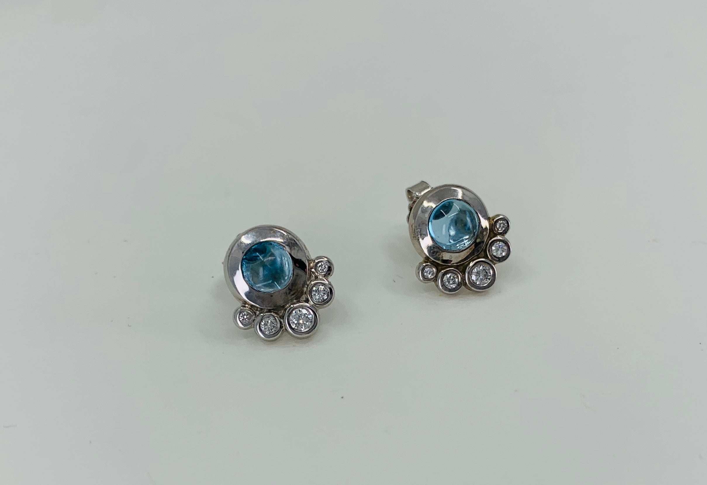 Blue topaz and diamond earrings
